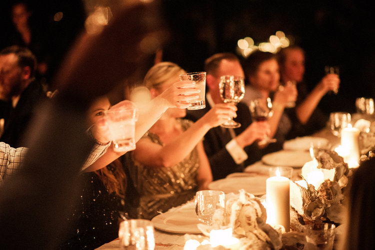 Candle-lit wedding with chic minimalist linens and oyster shells